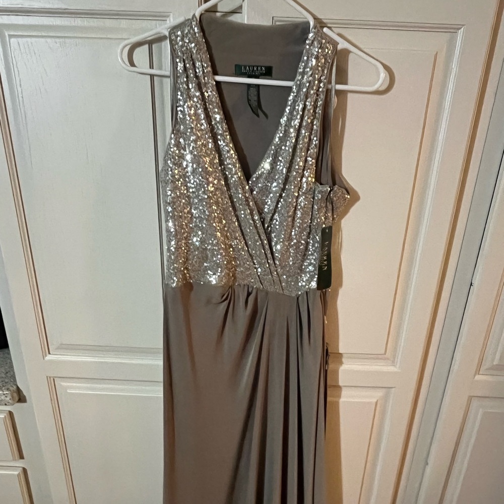 Floor length evening gown never worn new with tags sleeveless